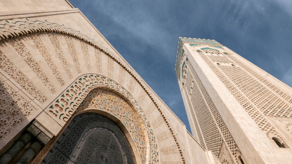bottom view photography of buildings under blue sky,morocco travel guide
