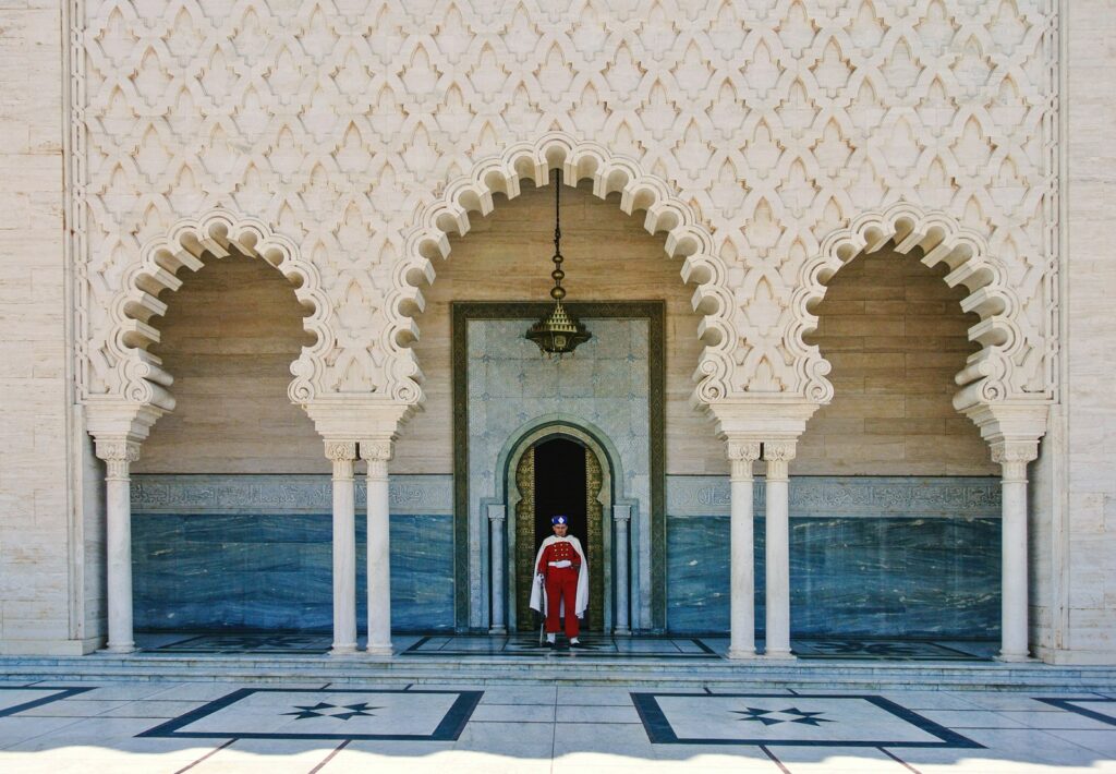 a person standing in a doorway of a building,Rabat North Africa