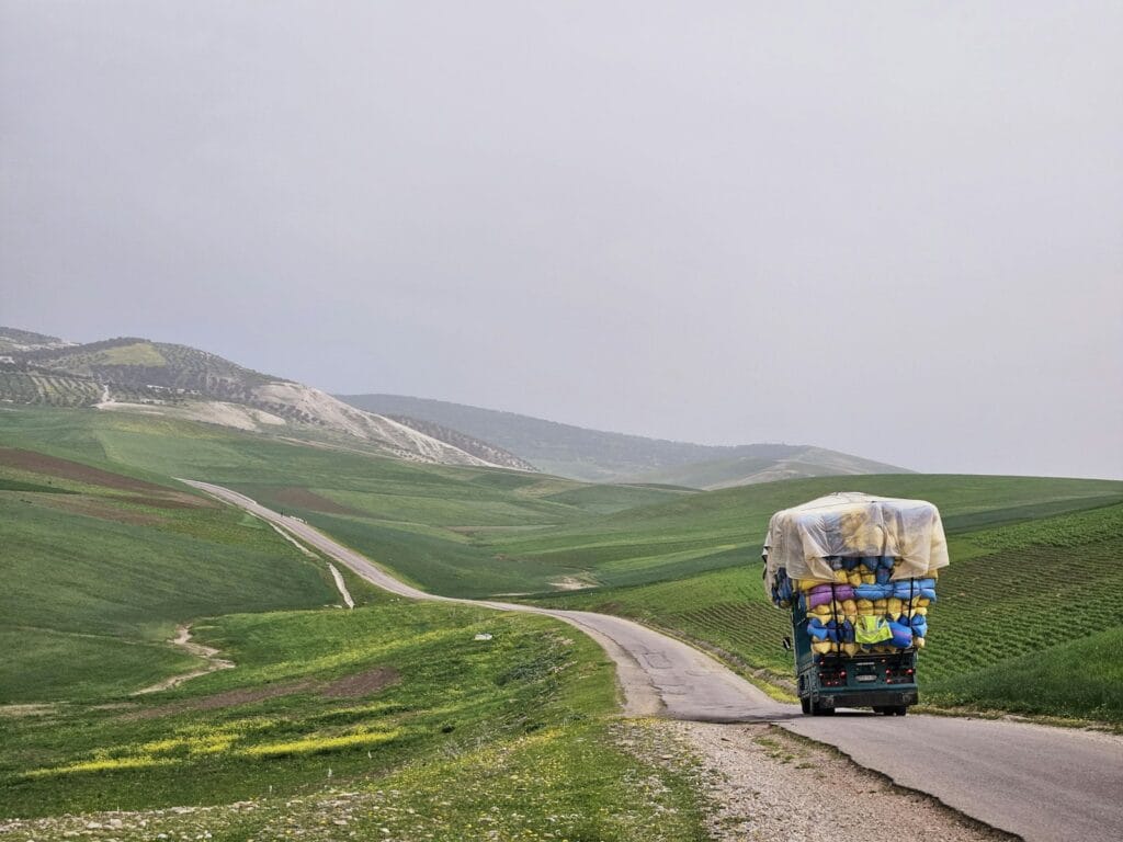 A truck driving down a road in the middle of nowhere, 2 days trip fez to chefchaouen