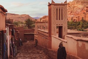 people walking on pathway near brown concrete building during daytime, tours from Marrakech