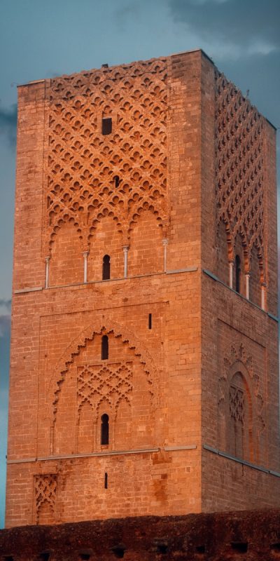 brown brick building under blue sky