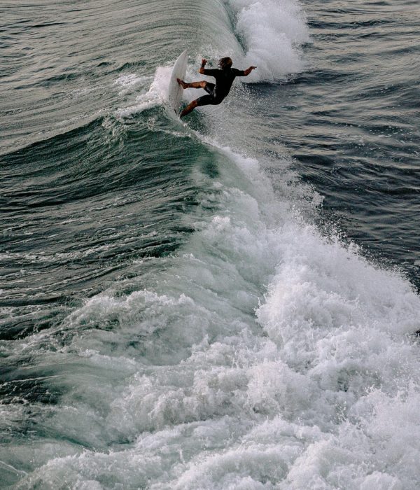 Surfing in Morocco Agadir: The Ultimate Guide to the Best Waves & Surf Camps 3 Captivating image of a surfer riding a powerful wave, showcasing skill and thrill in ocean sports.surfing in morocco agadir