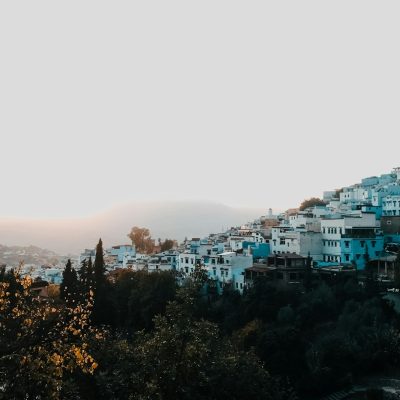 a view of a city from a hill