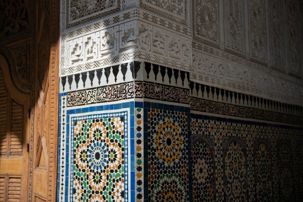 A tall building with a colorful tile design on it's side.morocco weather in february
