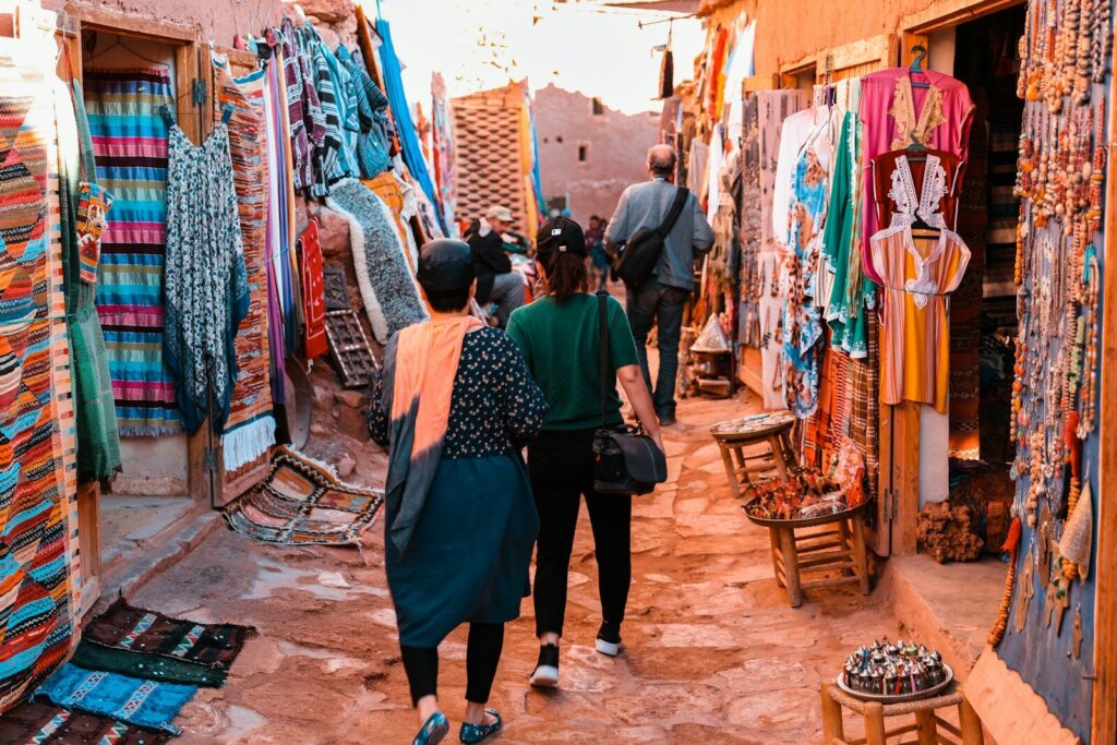 people walking on market during daytime.How to say hello in Morocco