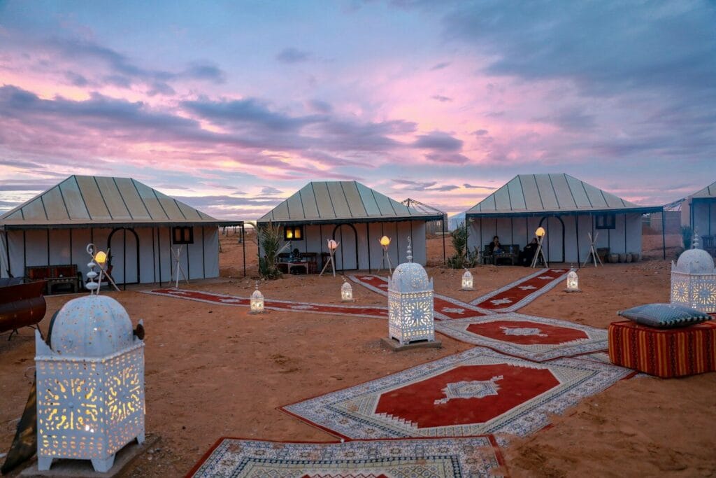 three houses near outdoor light during daytime.Weather in Morocco in July