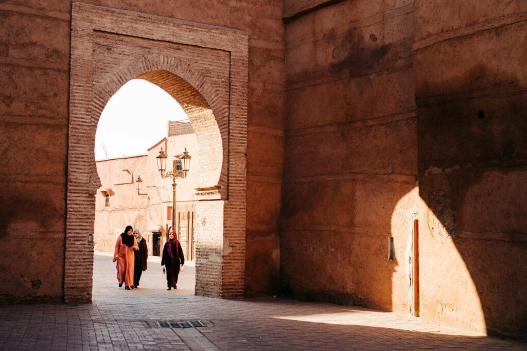 people walking on sidewalk during daytime.Weather in Morocco in July