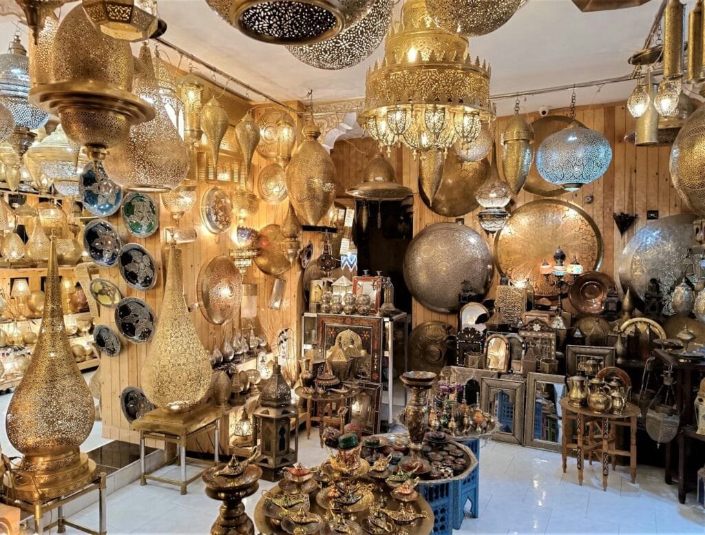 a room filled with lots of different types of lights.lanterns in morocco