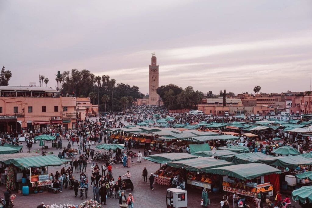people walking on street near buildings during daytime.Is Morocco safe for Jews